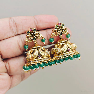 Nakshi green beaded Peacock Jhumkas