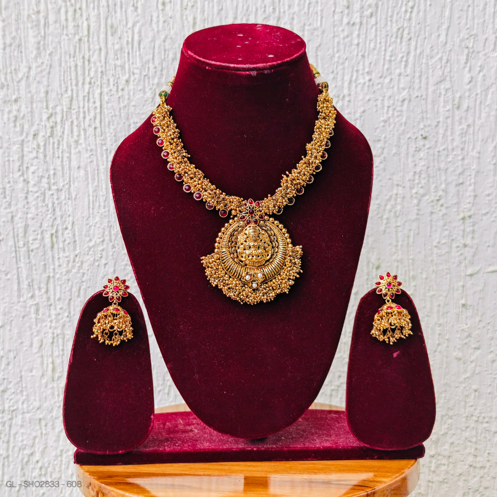 Golden clustered Lakshmi necklace set