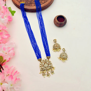Traditional long Kundan necklace and earring set with blue beads