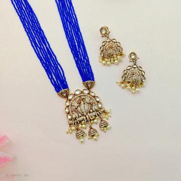 Traditional long Kundan necklace and earring set with blue beads