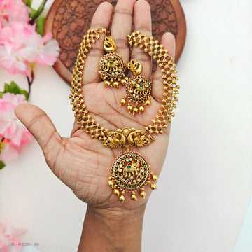 gold-plated peacock and elephant motifs set