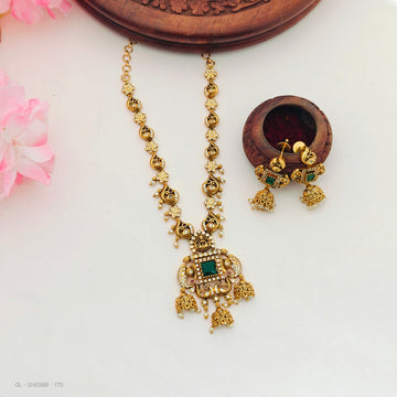 gold-plated peacock and elephant motifs set