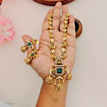 gold-plated peacock and elephant motifs set