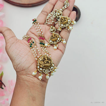 Traditional  temple jewelry with pearl and deity pendant