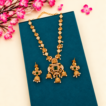 gold-plated peacock and elephant motifs set